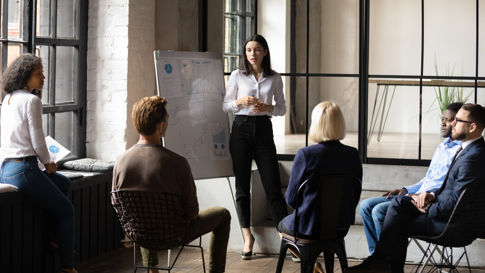 Business coach explaining effective follow-up strategies