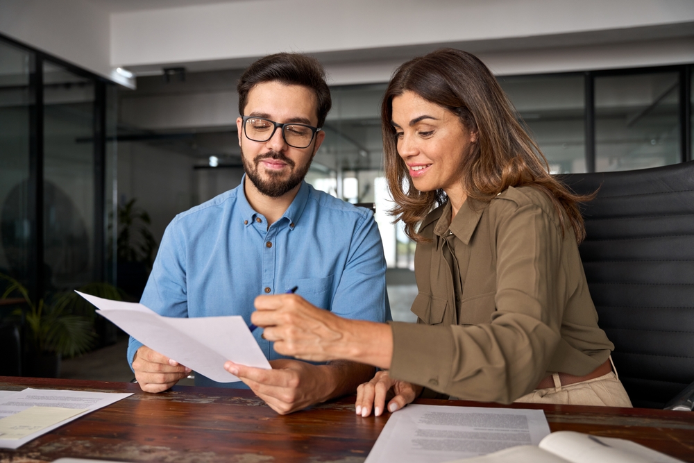 Salesperson presenting options to a client
