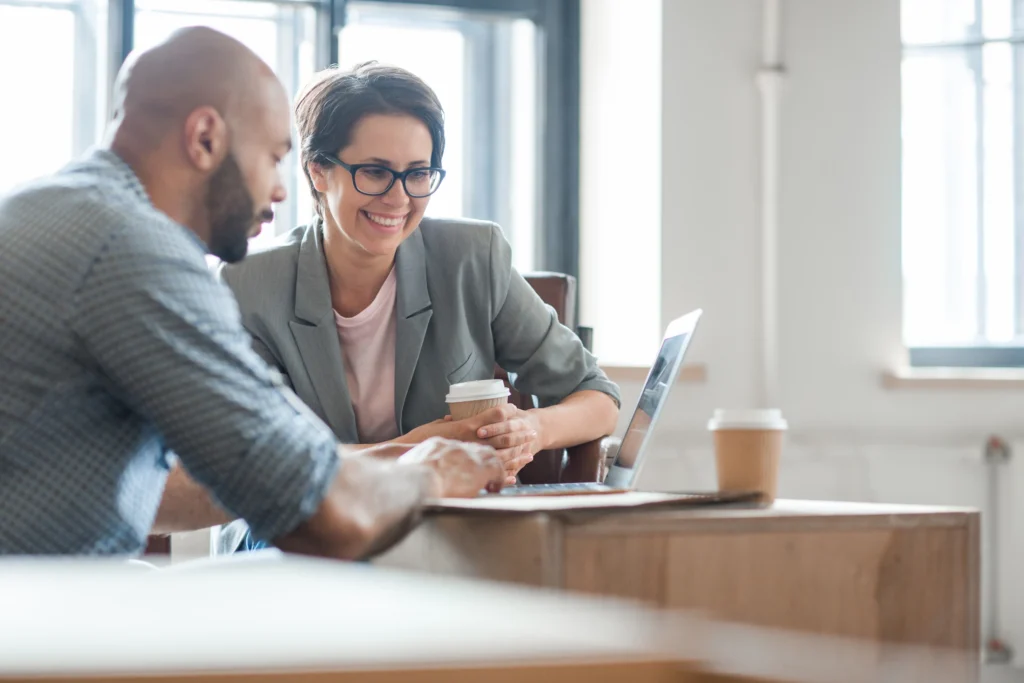Sales professional using assumptive sales phrases to close a deal.