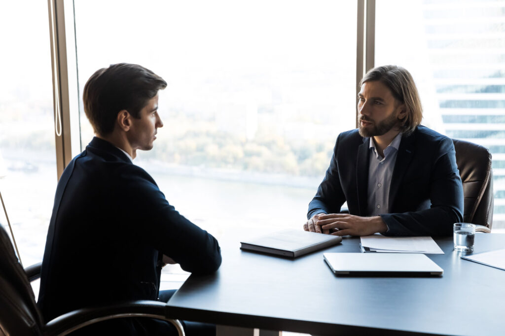 Sales coach guiding a prospect to visualize success with a product.
