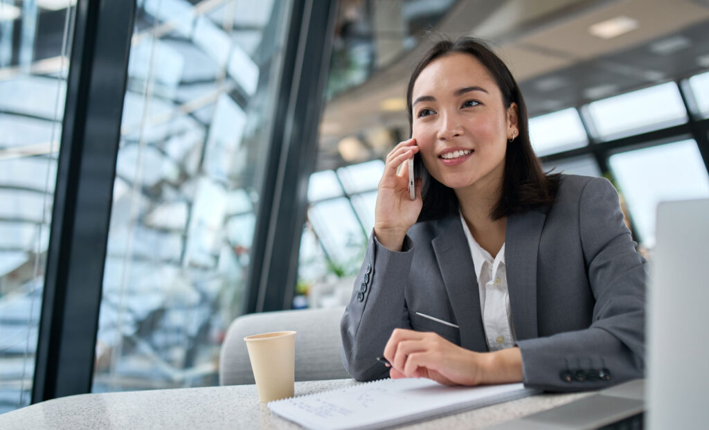 Sales professional using event-based urgency techniques during a client call.