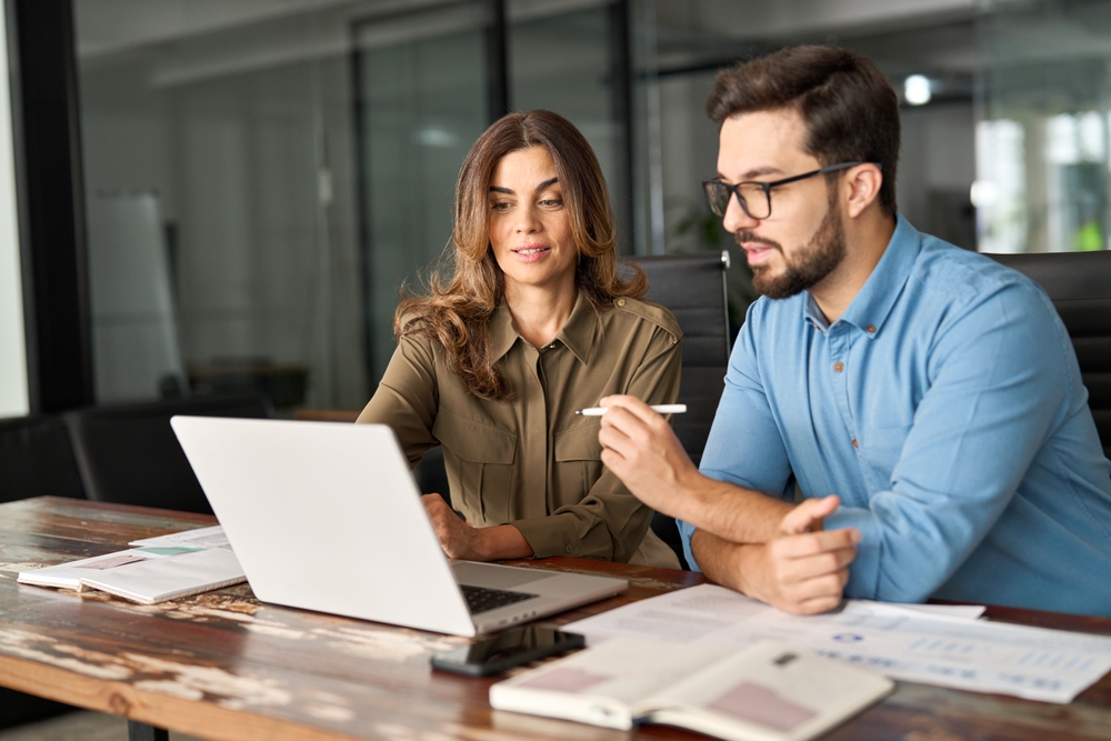 Sales professional analyzing customer profiles